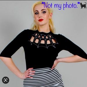 Soft spooky sweater blouse with bust cutouts and embroidery. Size XXL.